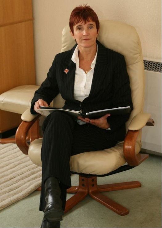 Picture Becky Wells Hypnotherapist on an chair
